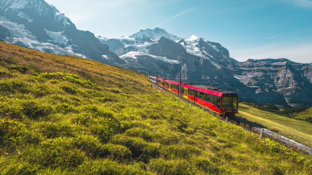 A view from the alps looking at a train